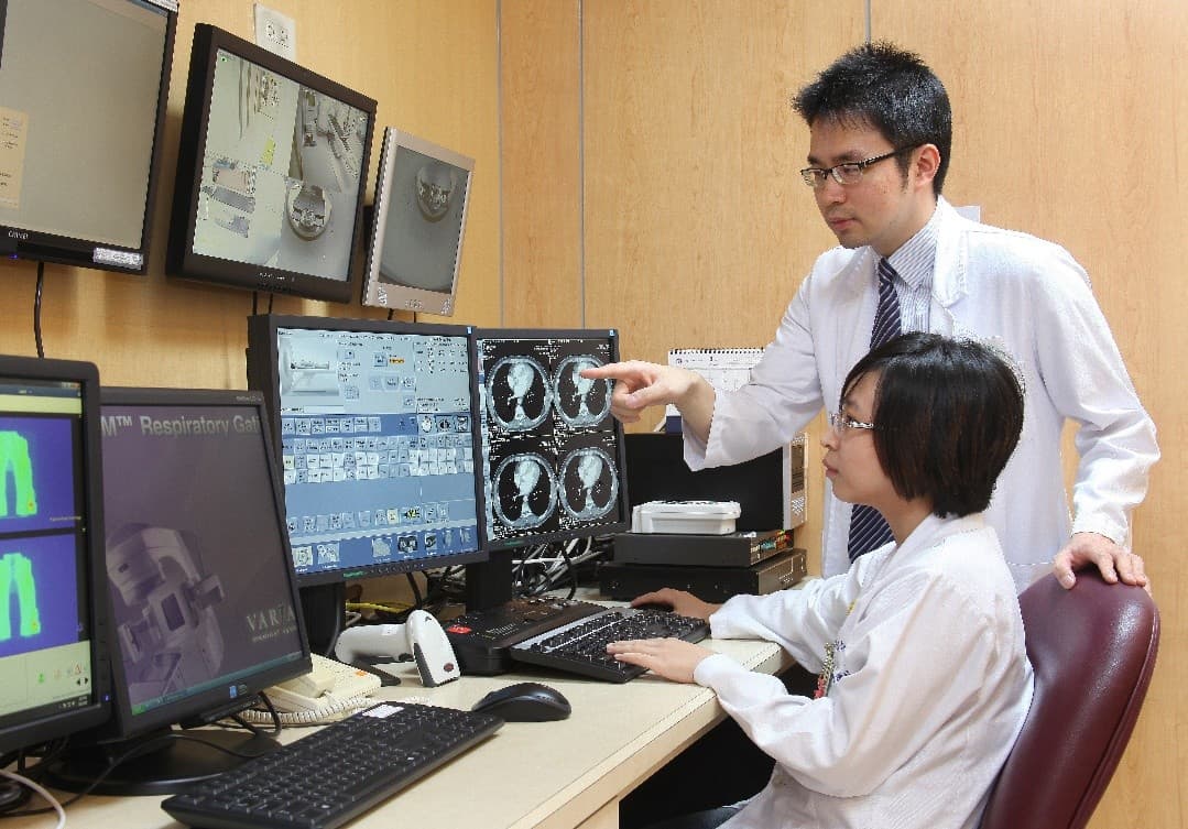 AI-assisted carotid arteries identification for optimized smart prep technique in slow contrast computed tomography Simulation